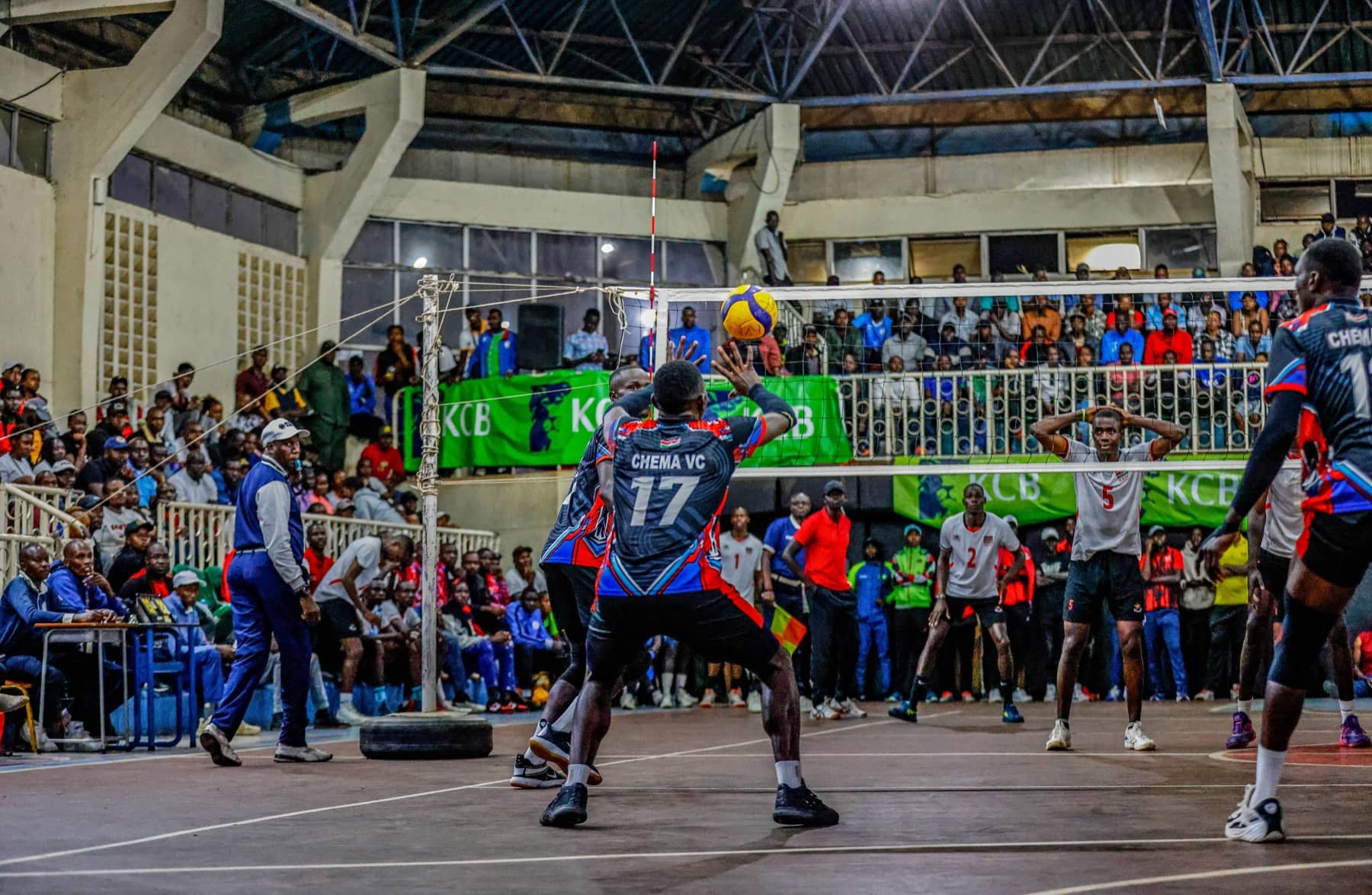 Chema VC squad celebrating on court after a key point