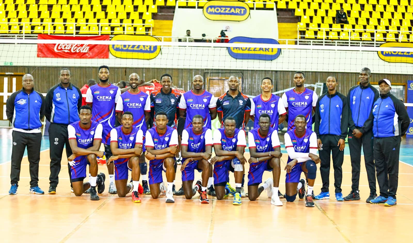 Chema VC players and staff pose after the quarterfinal win over KAPU.